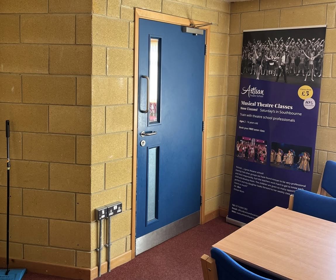 Fire door inspection on a communal blue fire door, Bournemouth